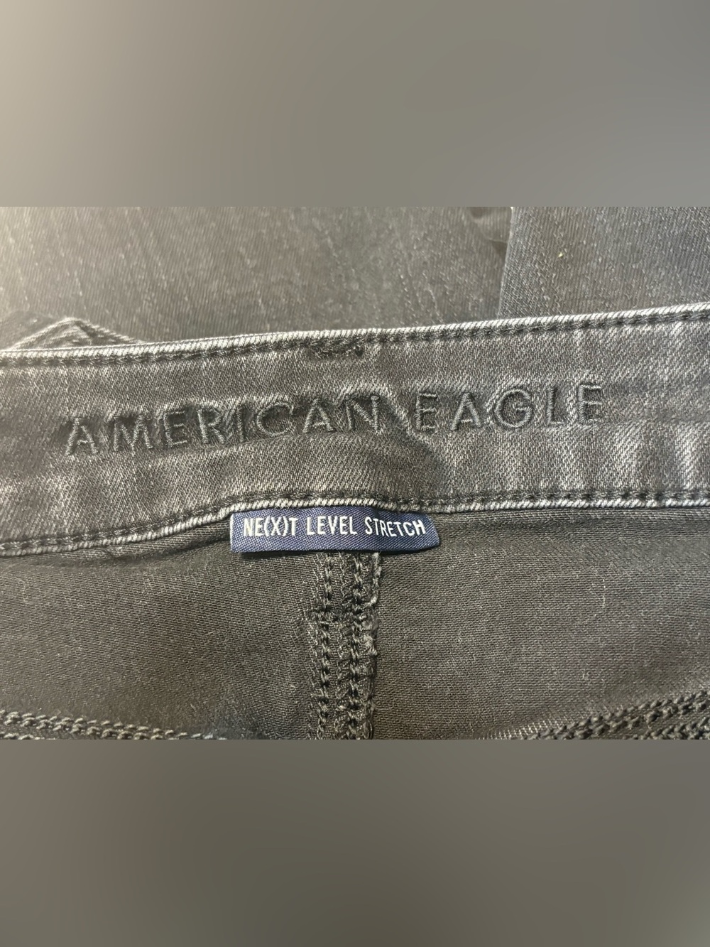 American Eagle Outfitters Black Next Level Stretch Ripped High-Rise Skinny Jeans - Picture 5 of 6